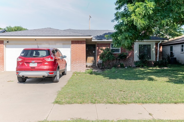 5210 S Milam St, Amarillo, TX 79110 - ranch-style house featuring brick siding, concrete driveway, and a garage