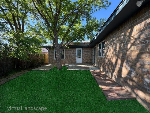 2607 15th Ave, Canyon, TX 79015 - view of yard featuring a patio