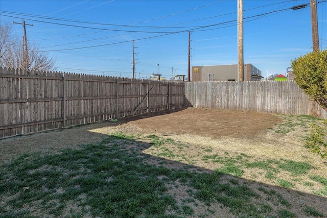 view of yard featuring a fenced backyard