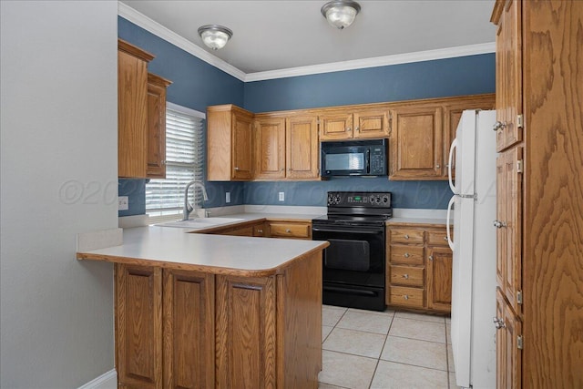 kitchen with a peninsula, a sink, black appliances, light countertops, and crown molding