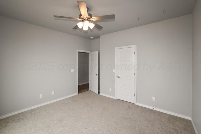 unfurnished bedroom with carpet floors and ceiling fan