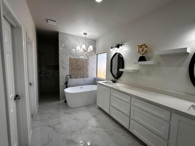 1513 SE 11th Ave, Amarillo, TX 79102 - full bath with double vanity, a freestanding tub, a chandelier, walk in shower, and marble finish flooring