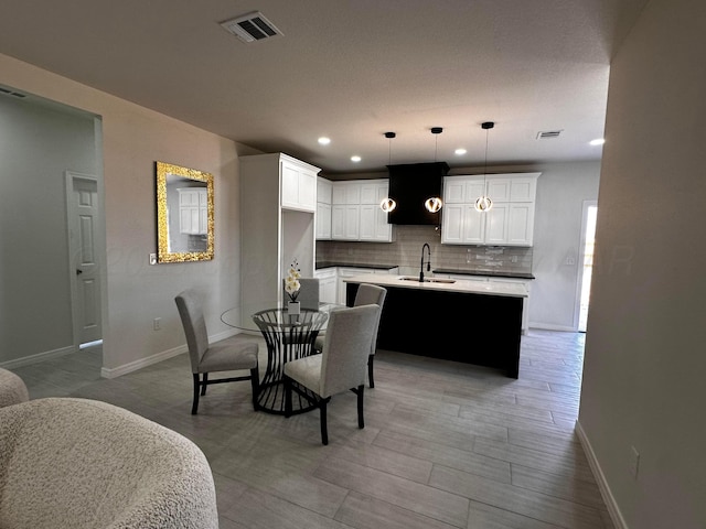1513 SE 11th Ave, Amarillo, TX 79102 - dining space with baseboards and recessed lighting