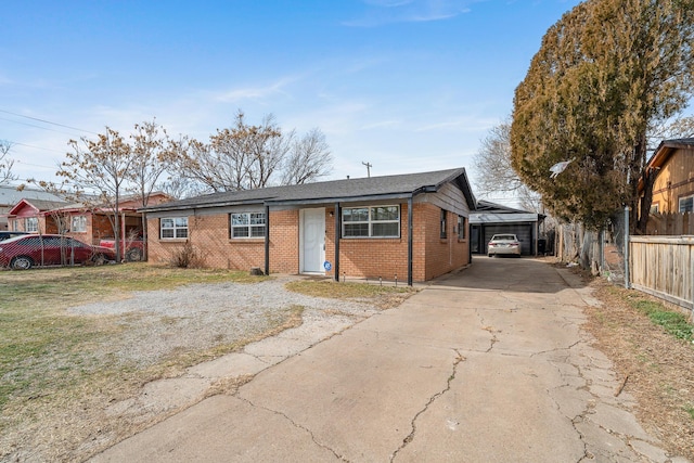 ranch-style house with a carport