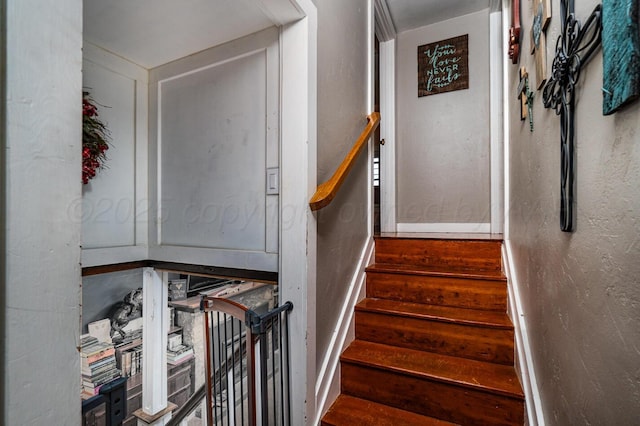 1203 Lee St, Borger, TX 79007 - stairway with wood finished floors