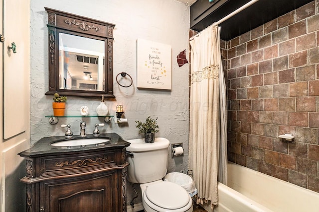 1203 Lee St, Borger, TX 79007 - full bath featuring vanity, toilet, and shower / bath combo with shower curtain