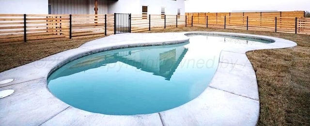 view of pool with a fenced in pool and a fenced backyard