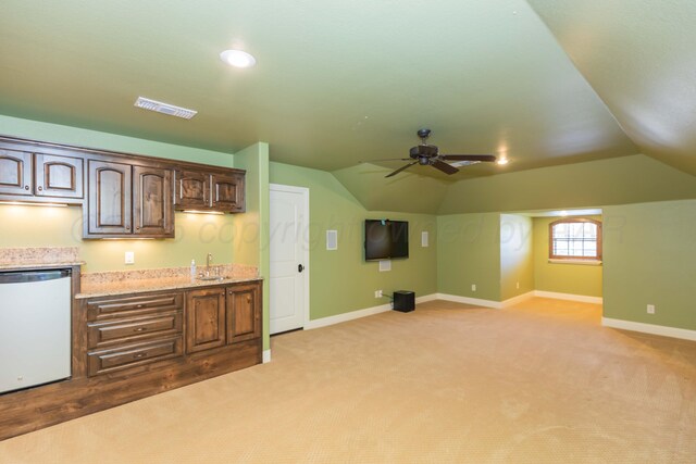 3 Country Club Dr, Amarillo, TX 79124 - bar featuring dishwashing machine, light colored carpet, lofted ceiling, and a ceiling fan