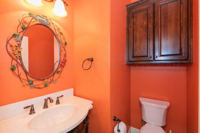 3 Country Club Dr, Amarillo, TX 79124 - bathroom with toilet and vanity