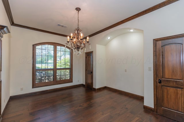 3 Country Club Dr, Amarillo, TX 79124 - empty room featuring a chandelier, dark wood-style floors, ornamental molding, arched walkways, and recessed lighting