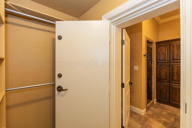 3 Country Club Dr, Amarillo, TX 79124 - bathroom featuring crown molding and tile patterned flooring