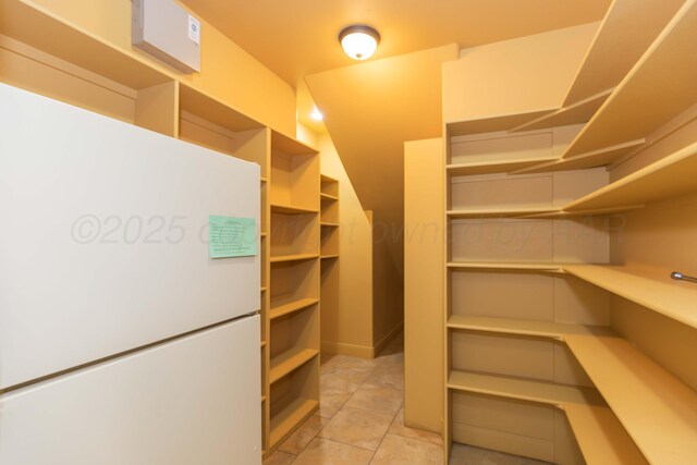 3 Country Club Dr, Amarillo, TX 79124 - walk in closet featuring light tile patterned flooring