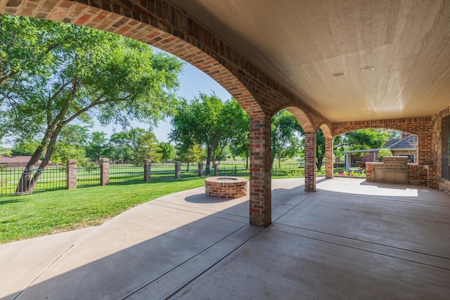 3 Country Club Dr, Amarillo, TX 79124 - view of patio with a fire pit and an outdoor kitchen