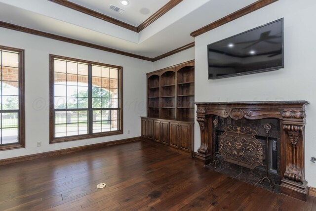 3 Country Club Dr, Amarillo, TX 79124 - living area with a fireplace, dark wood-style flooring, plenty of natural light, crown molding, and a tray ceiling
