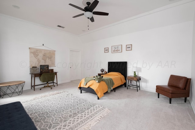 bedroom with ornamental molding, carpet floors, and ceiling fan