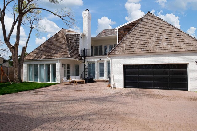 view of front of home with a balcony