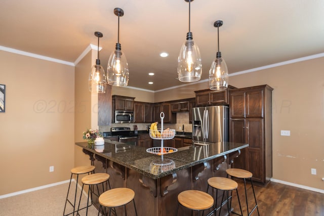 7116 Bennett St, Amarillo, TX 79119 - kitchen featuring appliances with stainless steel finishes, dark brown cabinets, baseboards, a kitchen bar, and ornamental molding