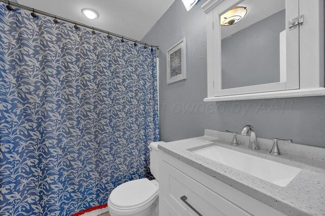 4215 S Tyler St, Amarillo, TX 79110 - full bathroom featuring vanity, a textured wall, and a shower with shower curtain
