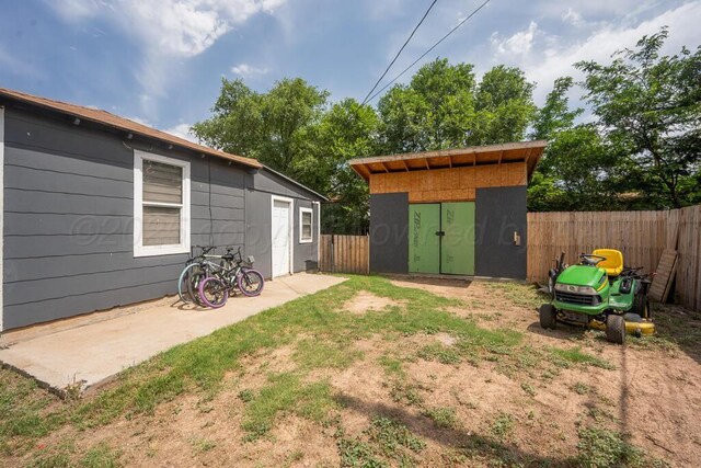 4215 S Tyler St, Amarillo, TX 79110 - fenced backyard featuring a storage shed