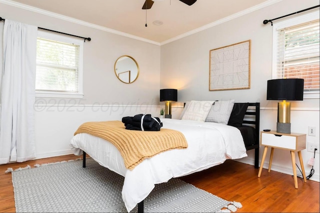 2406 Anna St, Amarillo, TX 79106 - bedroom with wood finished floors, crown molding, baseboards, and a ceiling fan