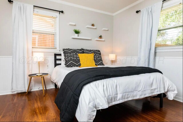 2406 Anna St, Amarillo, TX 79106 - bedroom with wood finished floors, ornamental molding, and a wainscoted wall
