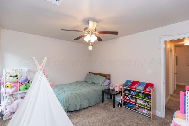 9310 Rockwood Dr, Amarillo, TX 79119 - bedroom featuring carpet floors, baseboards, a ceiling fan, and visible vents