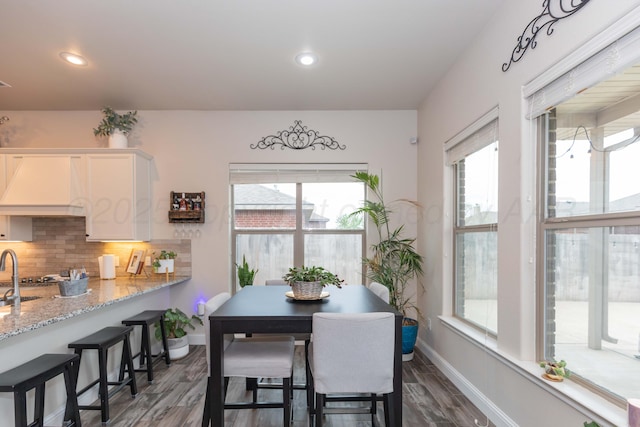 9310 Rockwood Dr, Amarillo, TX 79119 - dining space with recessed lighting, baseboards, and dark wood finished floors