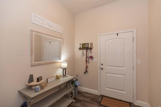 9310 Rockwood Dr, Amarillo, TX 79119 - entryway featuring baseboards and dark wood finished floors