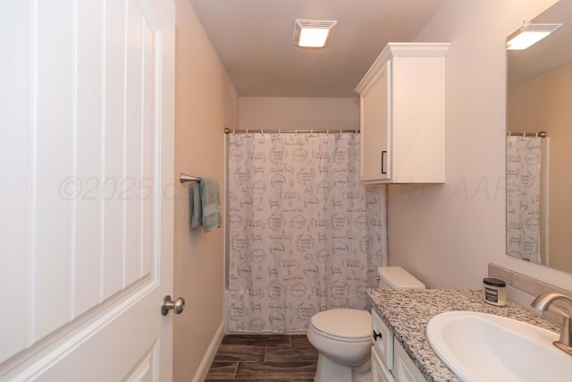 9310 Rockwood Dr, Amarillo, TX 79119 - full bathroom featuring vanity, toilet, baseboards, a shower with curtain, and visible vents