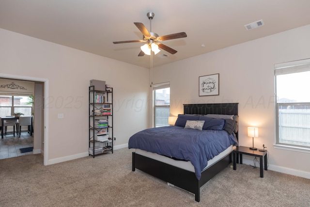 9310 Rockwood Dr, Amarillo, TX 79119 - bedroom with baseboards, light colored carpet, and visible vents