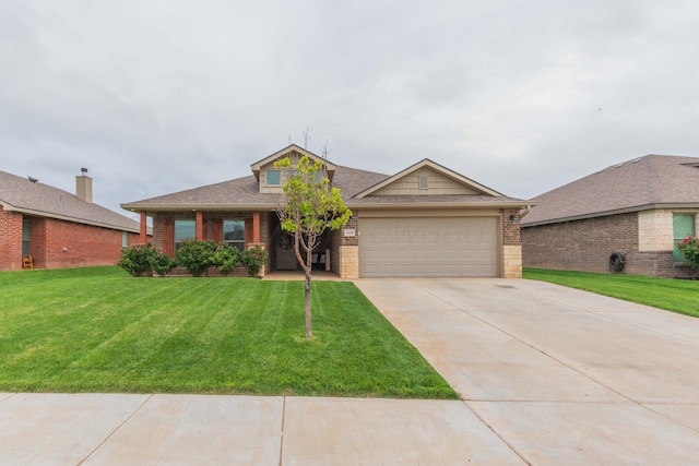 9310 Rockwood Dr, Amarillo, TX 79119 - view of front facade with concrete driveway, brick siding, an attached garage, and a front yard