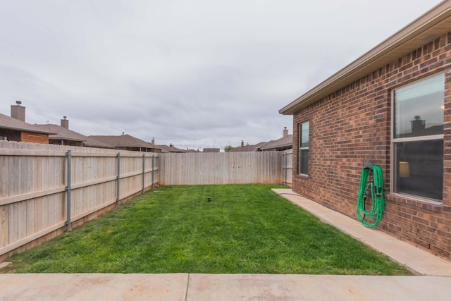 9310 Rockwood Dr, Amarillo, TX 79119 - view of yard with a fenced backyard