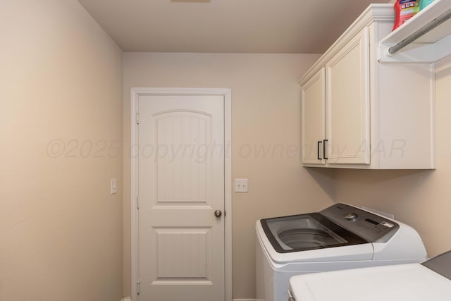 9310 Rockwood Dr, Amarillo, TX 79119 - laundry area with washer and clothes dryer and cabinet space