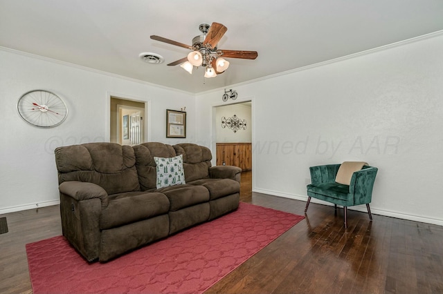 living room featuring crown molding, dark hardwood / wood-style floors, and ceiling fan