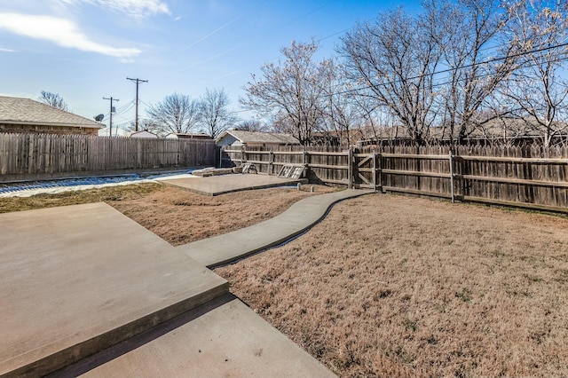 view of yard with a patio area