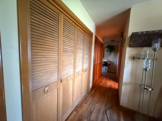 209 N Bowie Ave, Tulia, TX 79088 - hall featuring wood finished floors