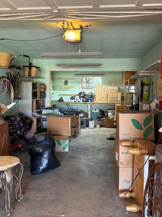 209 N Bowie Ave, Tulia, TX 79088 - garage featuring a garage door opener