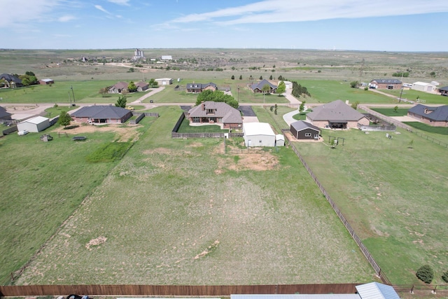 aerial view with a rural view and a residential view