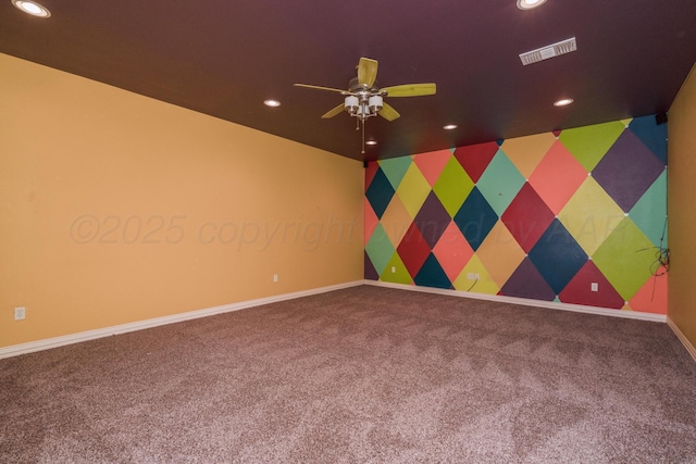spare room with carpet floors, visible vents, baseboards, recessed lighting, and a ceiling fan