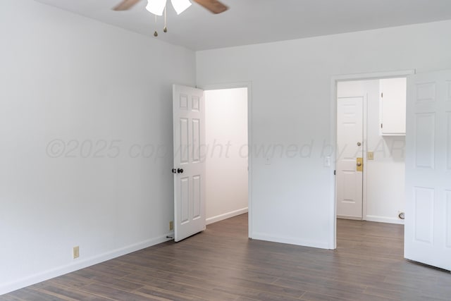 508 S Austin St, Shamrock, TX 79079 - empty room featuring a ceiling fan and dark wood-type flooring