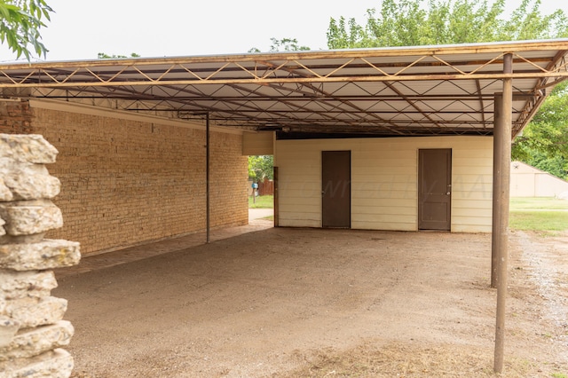 508 S Austin St, Shamrock, TX 79079 - view of vehicle parking featuring an attached carport
