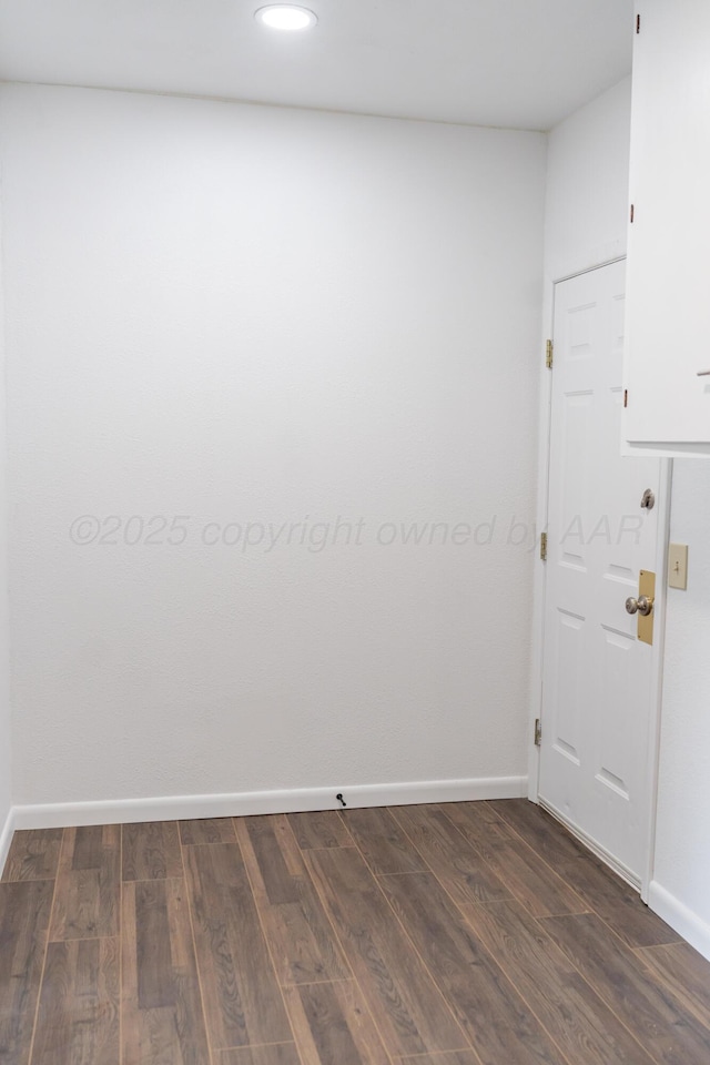 508 S Austin St, Shamrock, TX 79079 - empty room with dark wood finished floors and recessed lighting