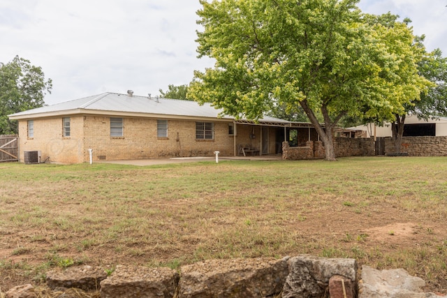 508 S Austin St, Shamrock, TX 79079 - back of house featuring a patio area and brick siding