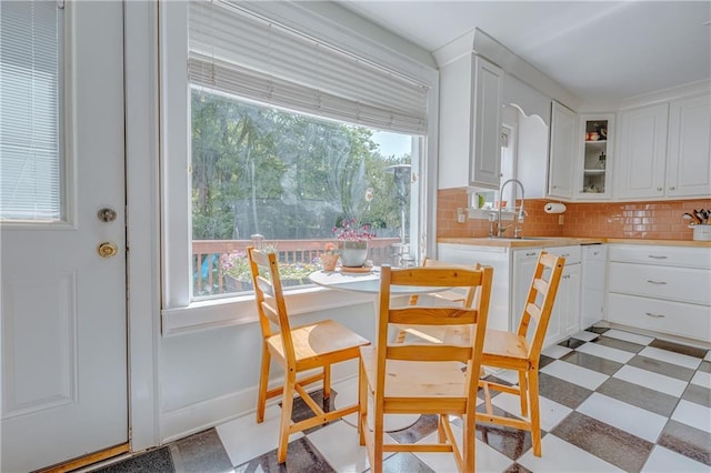 dining area featuring light floors
