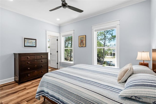 204 Magnolia Ct, Dauphin Island, AL 36528 - bedroom featuring ornamental molding, a ceiling fan, recessed lighting, light wood finished floors, and baseboards