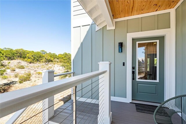 204 Magnolia Ct, Dauphin Island, AL 36528 - property entrance with board and batten siding