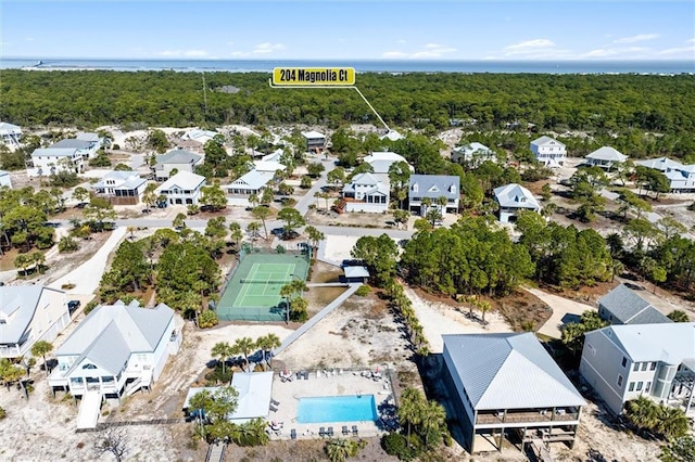 204 Magnolia Ct, Dauphin Island, AL 36528 - aerial view featuring a residential view and a wooded view