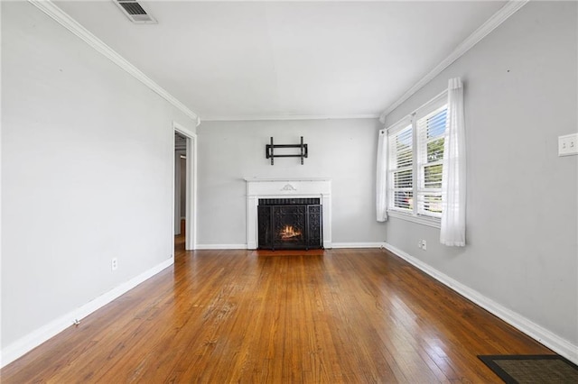 120 Shell Road Pl, Mobile, AL 36607 - unfurnished living room featuring hardwood / wood-style flooring, a fireplace with flush hearth, and ornamental molding