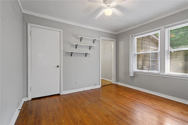 120 Shell Road Pl, Mobile, AL 36607 - unfurnished bedroom featuring wood finished floors, crown molding, a closet, and a ceiling fan