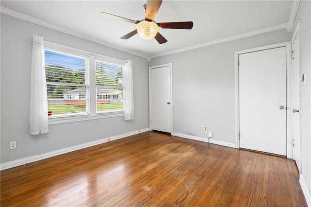 120 Shell Road Pl, Mobile, AL 36607 - unfurnished bedroom featuring hardwood / wood-style floors, ornamental molding, multiple closets, and a ceiling fan